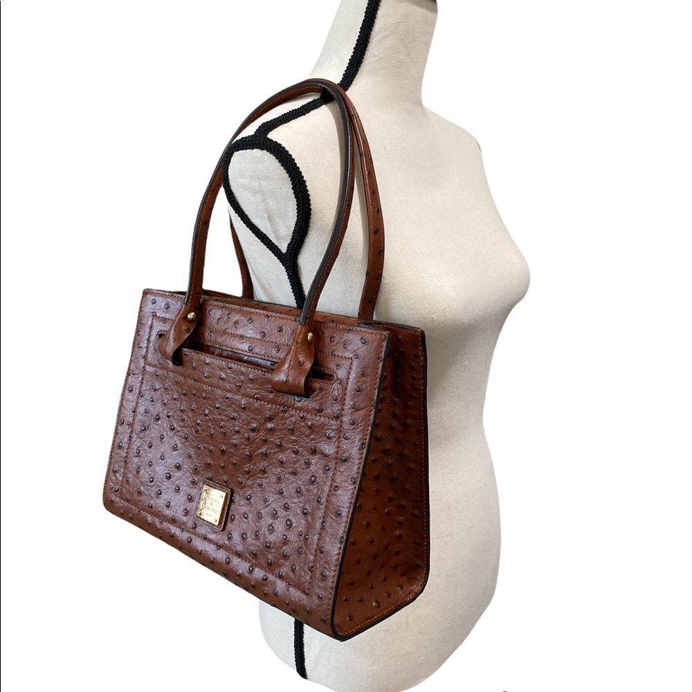 Brand New Dooney & Bourke leather purse with dust bag